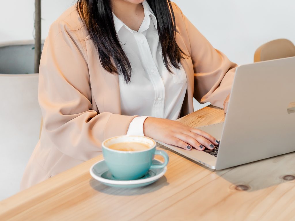 Female entrepreneur working on laptop